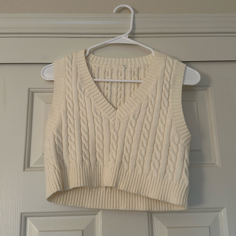 Small white sweater vest